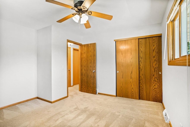 407 Edward St, Verona, WI 53593 - unfurnished bedroom featuring carpet, a closet, a ceiling fan, and baseboards