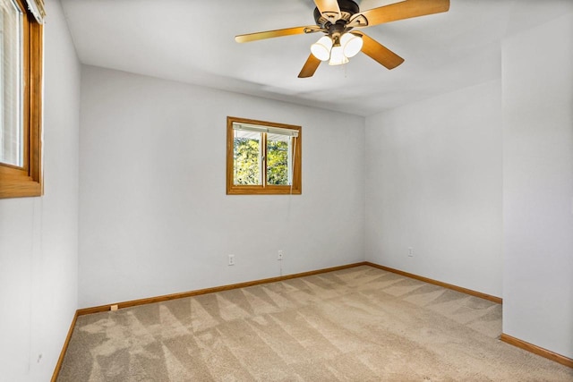 407 Edward St, Verona, WI 53593 - unfurnished room with light colored carpet, baseboards, and ceiling fan