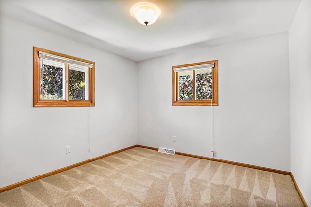 407 Edward St, Verona, WI 53593 - empty room featuring carpet floors and baseboards