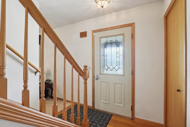 7938 E Hwy 59, Milton, WI 53563 - foyer entrance with stairway and wood finished floors