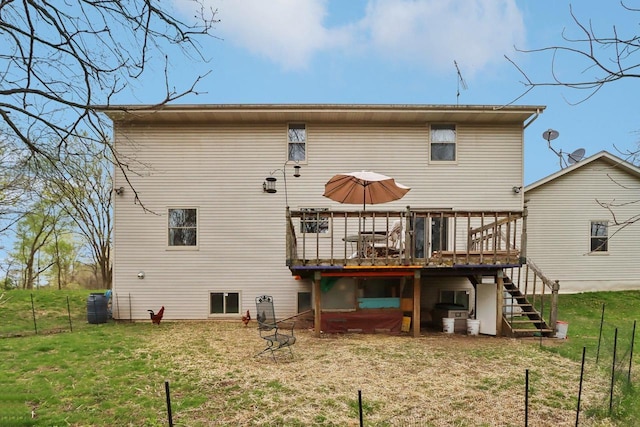 7938 E Hwy 59, Milton, WI 53563 - back of house with a deck, stairway, and a yard