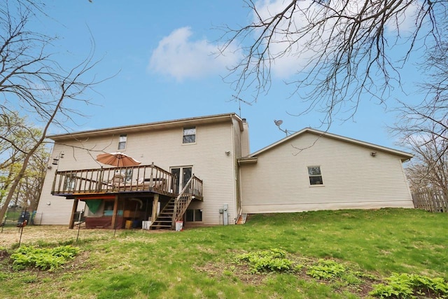 7938 E Hwy 59, Milton, WI 53563 - rear view of house with a wooden deck, stairway, and a lawn