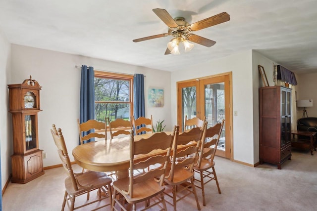 7938 E Hwy 59, Milton, WI 53563 - dining room featuring light colored carpet, baseboards, and ceiling fan