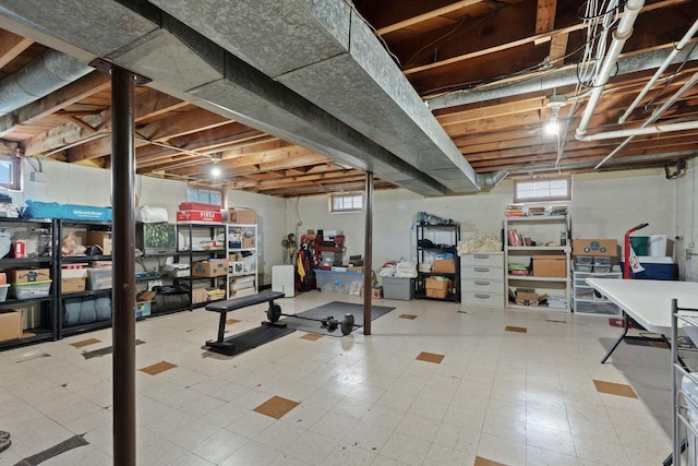 9517 W Capitol Dr, Milwaukee, WI 53222 - basement featuring concrete block wall and tile patterned floors
