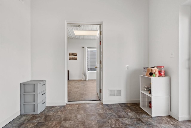 657 Elm St, Black River Falls, WI 54615 - unfurnished room featuring baseboards and stone finish floors
