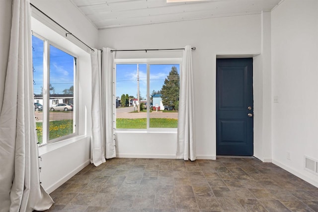 657 Elm St, Black River Falls, WI 54615 - unfurnished room featuring stone finish floors and baseboards