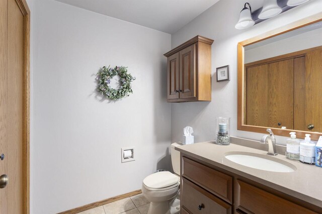 37 Pheasant Ct, Appleton, WI 54915 - bathroom featuring tile patterned floors, toilet, and vanity