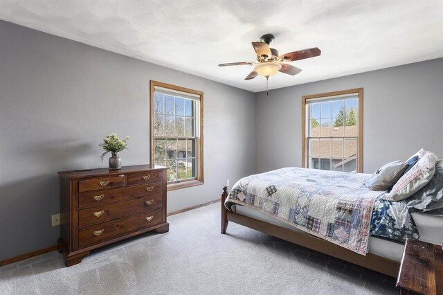 37 Pheasant Ct, Appleton, WI 54915 - bedroom featuring baseboards, light carpet, and a ceiling fan