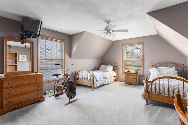 37 Pheasant Ct, Appleton, WI 54915 - carpeted bedroom featuring lofted ceiling, ceiling fan, and baseboards