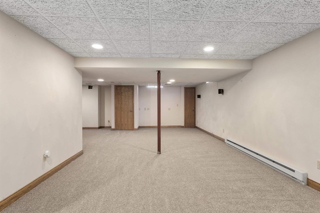 37 Pheasant Ct, Appleton, WI 54915 - finished basement with baseboard heating, light colored carpet, baseboards, recessed lighting, and a drop ceiling