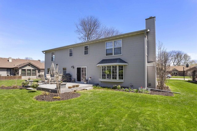 37 Pheasant Ct, Appleton, WI 54915 - rear view of property with a chimney and a lawn