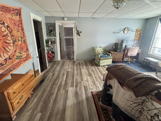 180 N Wisconsin St, Berlin, WI 54923 - bedroom with a paneled ceiling, wood finished floors, and baseboards