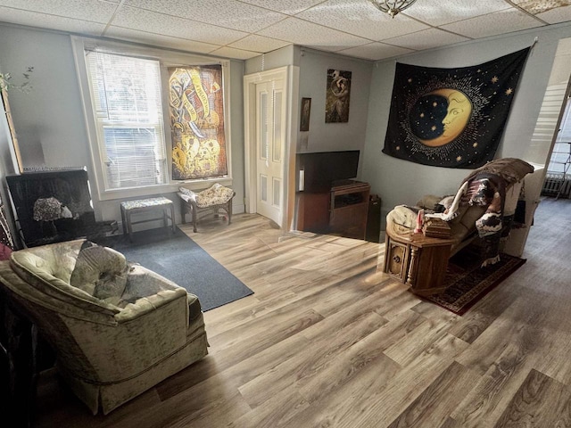 180 N Wisconsin St, Berlin, WI 54923 - living area with a drop ceiling and wood finished floors