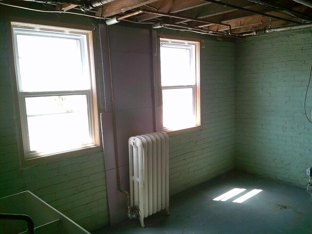 2309 Jefferson St, Two Rivers, WI 54241 - basement with radiator heating unit