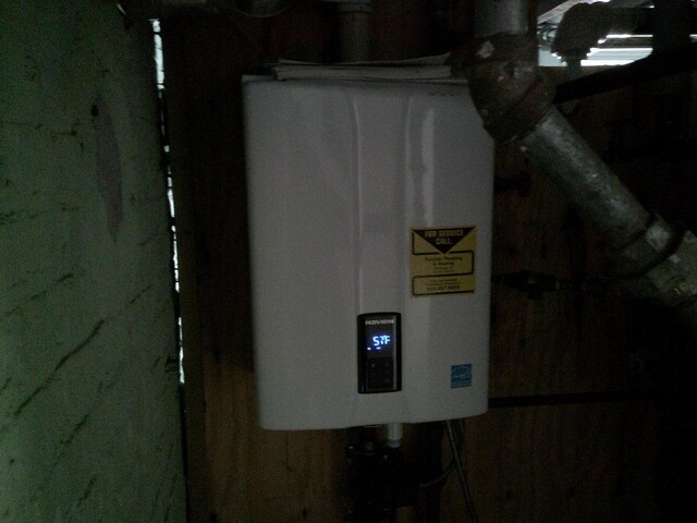 2309 Jefferson St, Two Rivers, WI 54241 - utility room featuring water heater
