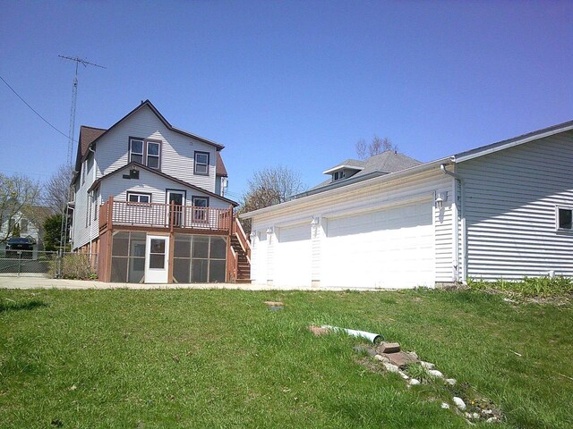 2309 Jefferson St, Two Rivers, WI 54241 - back of house with stairway and a wooden deck