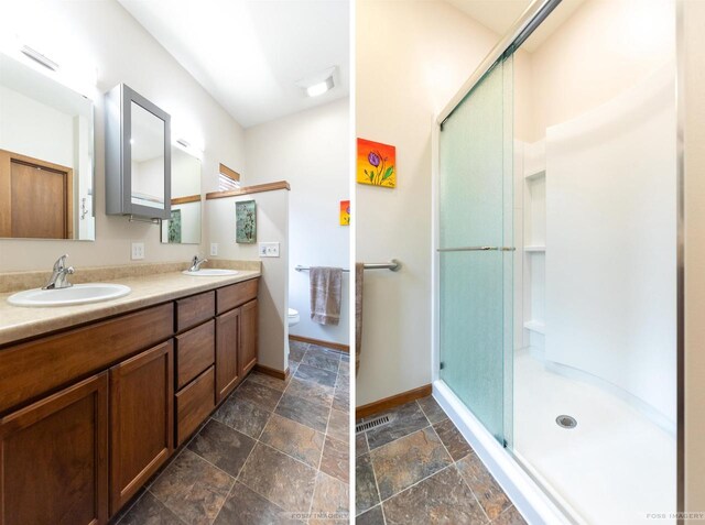 222 Blooming Leaf Way, Verona, WI 53593 - full bathroom featuring a stall shower, stone finish flooring, toilet, double vanity, and baseboards