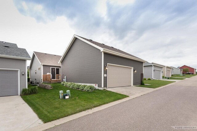 222 Blooming Leaf Way, Verona, WI 53593 - view of front of house featuring a front lawn, a garage, and concrete driveway