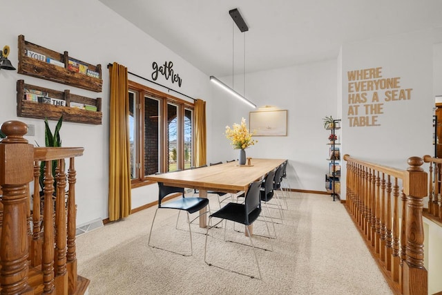 2108 Lawrence Dr, De Pere, WI 54115 - dining room featuring baseboards and carpet