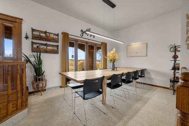 2108 Lawrence Dr, De Pere, WI 54115 - dining space featuring carpet floors and baseboards