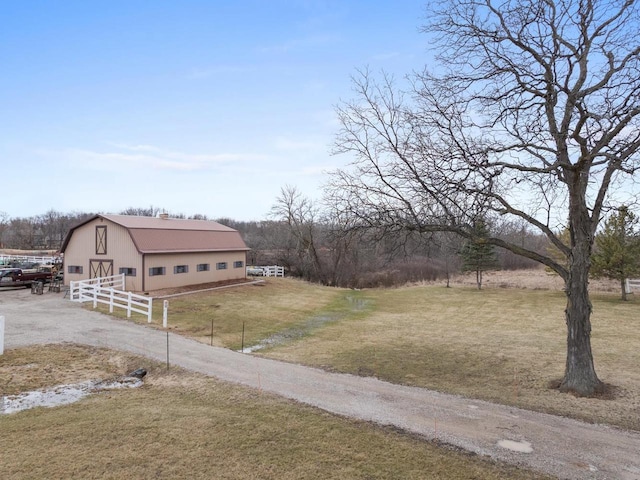 2108 Lawrence Dr, De Pere, WI 54115 - view of home's exterior featuring an outdoor structure, a barn, and a gambrel roof
