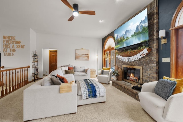 2108 Lawrence Dr, De Pere, WI 54115 - carpeted living area with a ceiling fan and a brick fireplace