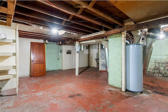 unfinished basement featuring gas water heater