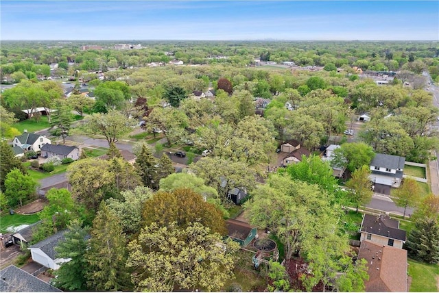 aerial overview of property's location with nearby suburban area