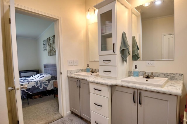 W5977 Lakeview Dr, Montello, WI 53949 - bathroom with crown molding, double vanity, and connected bathroom