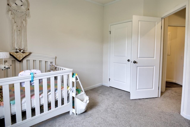 W5977 Lakeview Dr, Montello, WI 53949 - carpeted bedroom with a crib, baseboards, and ornamental molding