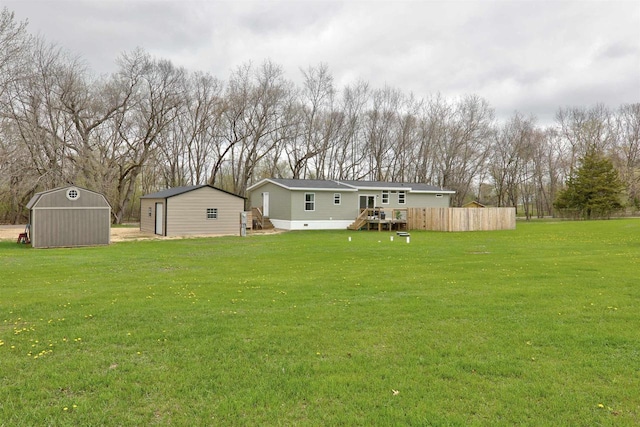 W5977 Lakeview Dr, Montello, WI 53949 - view of yard featuring a shed, an outdoor structure, and view of scattered trees