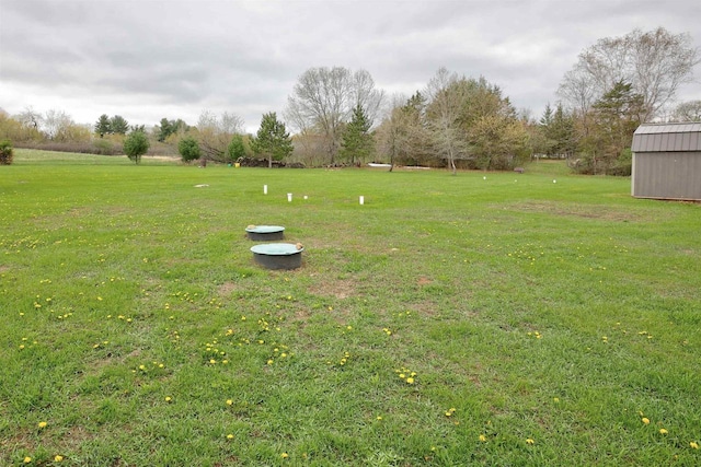 W5977 Lakeview Dr, Montello, WI 53949 - view of green lawn featuring an outbuilding