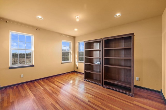 N109W14760 Preserve Pkwy, Germantown, WI 53022 - empty room featuring baseboards, recessed lighting, and wood finished floors