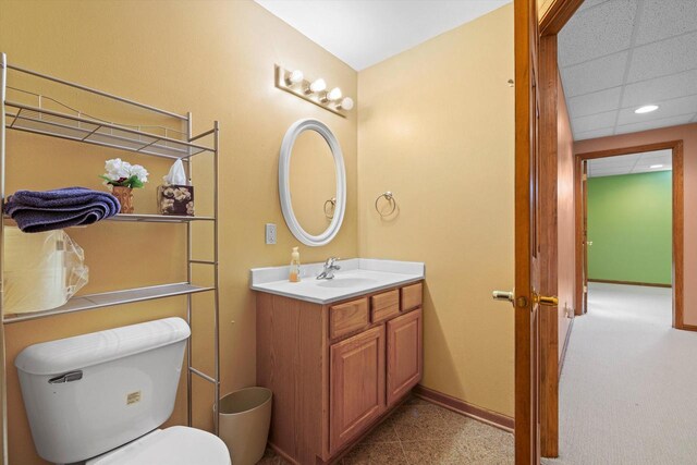 N109W14760 Preserve Pkwy, Germantown, WI 53022 - bathroom featuring toilet, vanity, baseboards, and recessed lighting