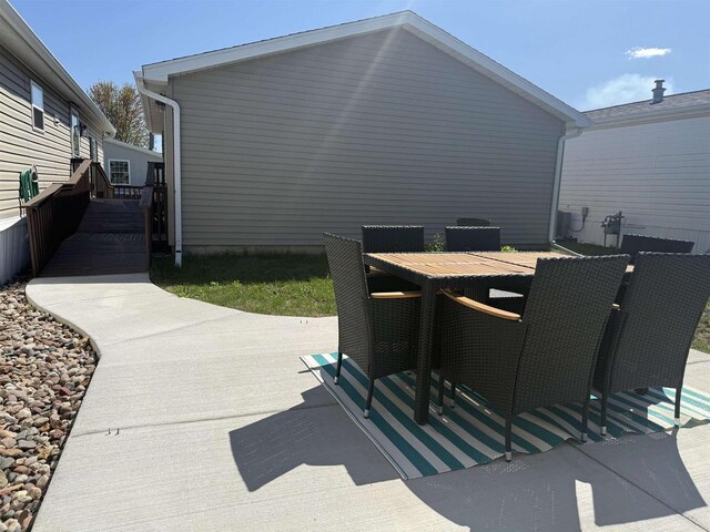 33150 Donna Dr Unit 14, Prairie Du Chien, WI 53821 - view of patio / terrace with outdoor dining space