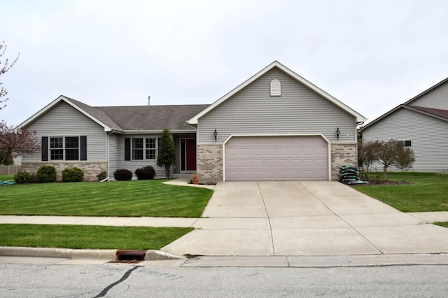 ranch-style house featuring brick siding, a garage, a front yard, and driveway
