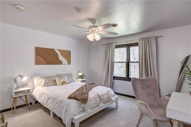 E1924 Kirk Ct, Eau Claire, WI 54701 - bedroom with light colored carpet, baseboards, and ceiling fan