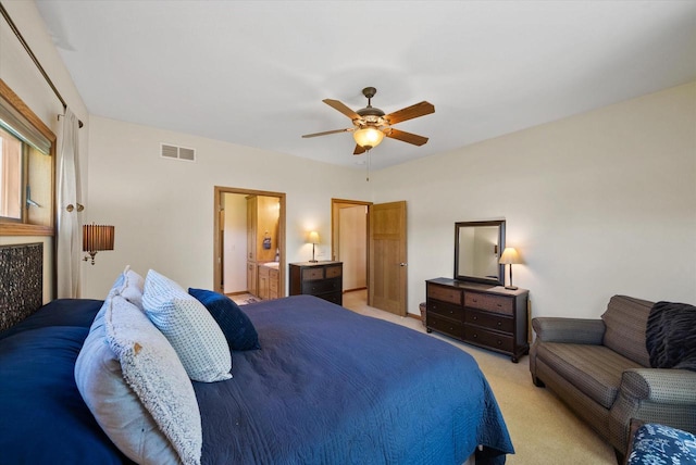 3271 Bay Hill Rd, Port Washington, WI 53074 - bedroom with light colored carpet, a ceiling fan, and connected bathroom