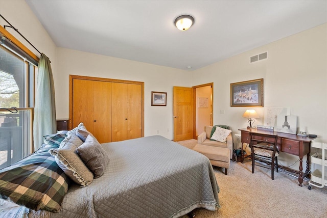 3271 Bay Hill Rd, Port Washington, WI 53074 - bedroom with light colored carpet and a closet