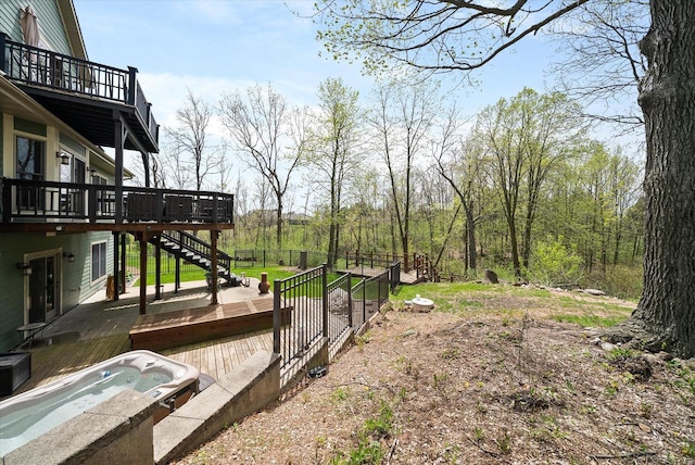3271 Bay Hill Rd, Port Washington, WI 53074 - view of yard with a deck, stairway, and an outdoor hot tub