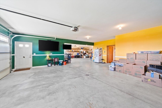 3271 Bay Hill Rd, Port Washington, WI 53074 - garage featuring a garage door opener