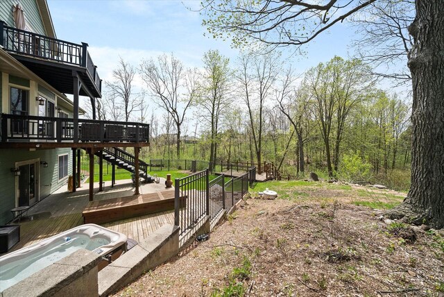 3271 Bay Hill Rd, Port Washington, WI 53074 - view of yard with a deck, stairway, and an outdoor hot tub