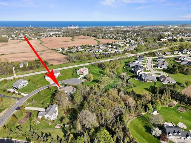 3271 Bay Hill Rd, Port Washington, WI 53074 - aerial overview of property's location with nearby suburban area and a large body of water