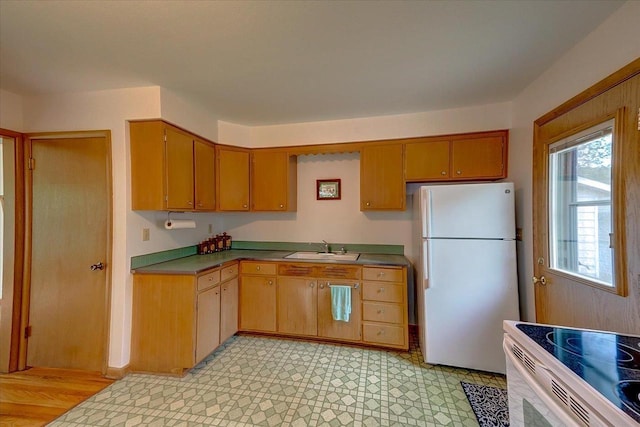 49 Schenk St, Madison, WI 53714 - kitchen featuring white appliances and a sink
