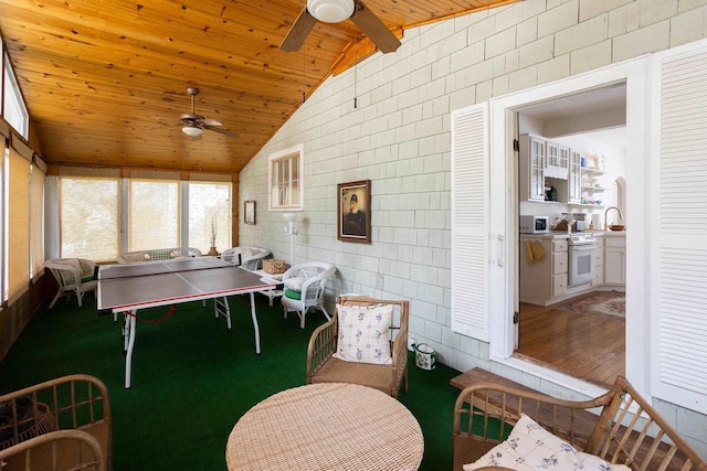 395 Lake St, Green Lake, WI 54941 - sunroom featuring a ceiling fan, vaulted ceiling, and a sink