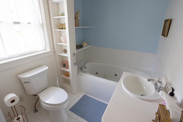 395 Lake St, Green Lake, WI 54941 - bathroom with a sink, tile patterned flooring, toilet, and a whirlpool tub