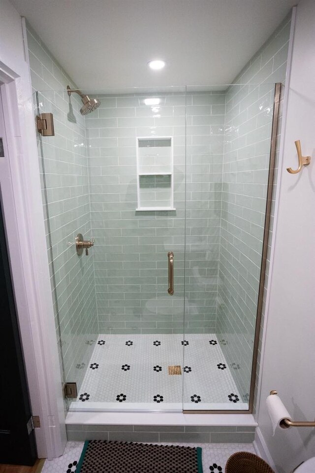 395 Lake St, Green Lake, WI 54941 - bathroom with a shower stall, tile patterned floors, and recessed lighting