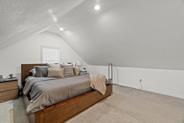 bedroom with light colored carpet, vaulted ceiling, a textured ceiling, baseboards, and recessed lighting