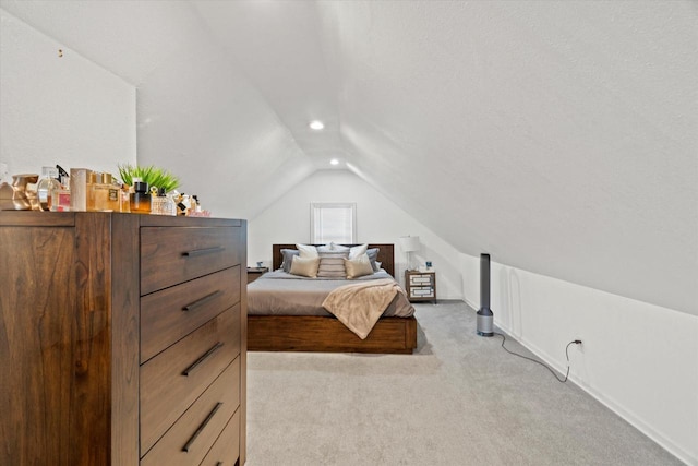 bedroom with lofted ceiling, carpet floors, recessed lighting, and baseboards