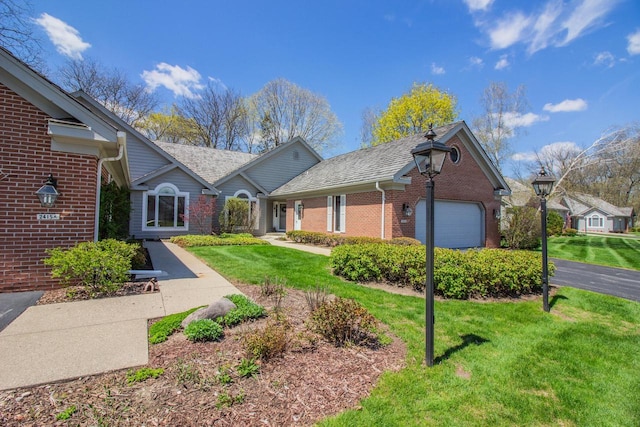 2415 Walnut Grove Ct Unit B, Brookfield, WI 53005 - ranch-style home with brick siding, a garage, a front lawn, and driveway